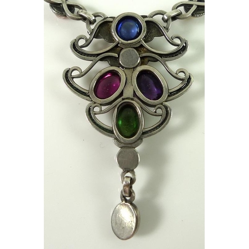 808 - A Continental Art Nouveau necklace of white and coloured stone cabochons including peridot, citrine,... 