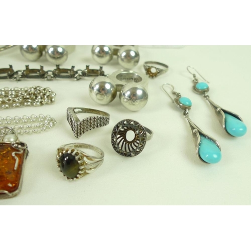 813 - A collection of silver jewellery, including earrings, rings and pendants, several pieces set with am... 