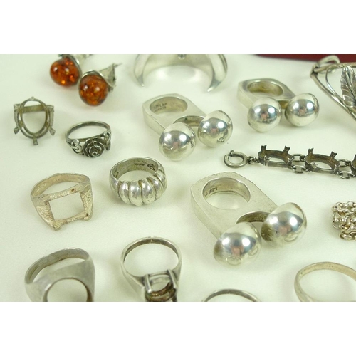 813 - A collection of silver jewellery, including earrings, rings and pendants, several pieces set with am... 