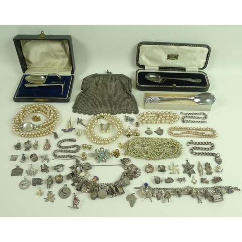 815 - A collection of jewellery including two silver charm bracelets with charms and further loose charms,... 