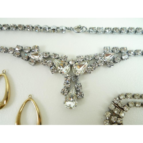 820 - A collection of gold and costume jewellery, including a 9ct gold heart link bracelet, a pair of 9ct ... 