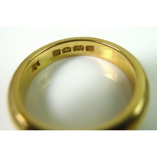 826 - A 22ct gold wedding band, hallmarked, size L, 7.8g.