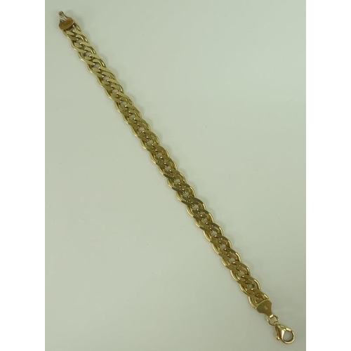 828 - A Turkish 14ct gold fancy curb link bracelet, stamped 14k, tested, 18cm, 15.8g.