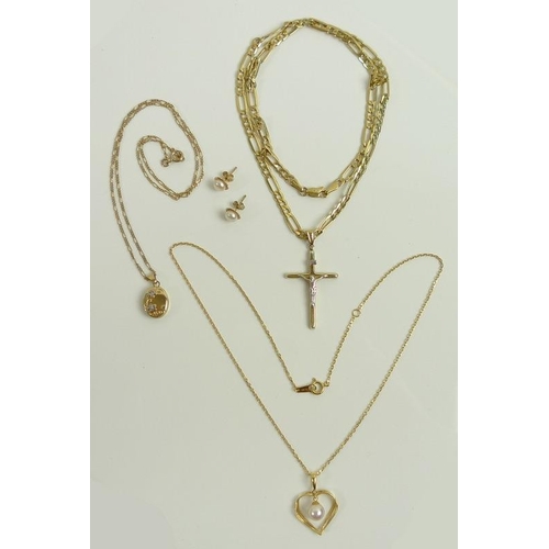 831 - A group of gold jewellery, comprising an 18K gold chain with 18K open heart and pearl pendant, 3.9g,... 