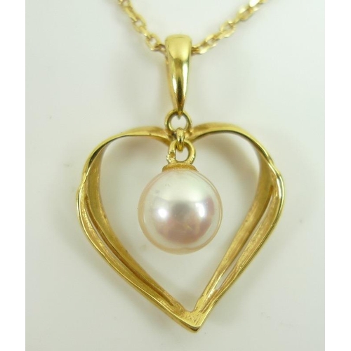 831 - A group of gold jewellery, comprising an 18K gold chain with 18K open heart and pearl pendant, 3.9g,... 