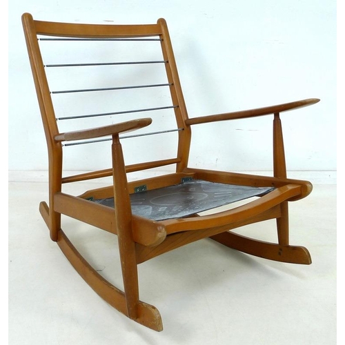 856 - A 1950's early model Scandart Ltd hardwood rocking chair, 84 by 66 by 80cm high.