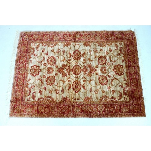 857 - A modern Zeigler rug with beige ground, red floral and foliate scrolling decoration, red borders, 19... 