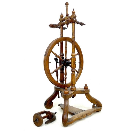 858 - A Victorian fruitwood spinning wheel, turned supports and scroll legs, 37 by 33 by 78cm high.