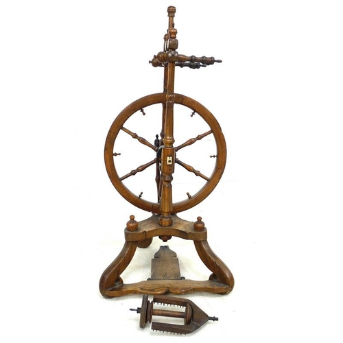 858 - A Victorian fruitwood spinning wheel, turned supports and scroll legs, 37 by 33 by 78cm high.