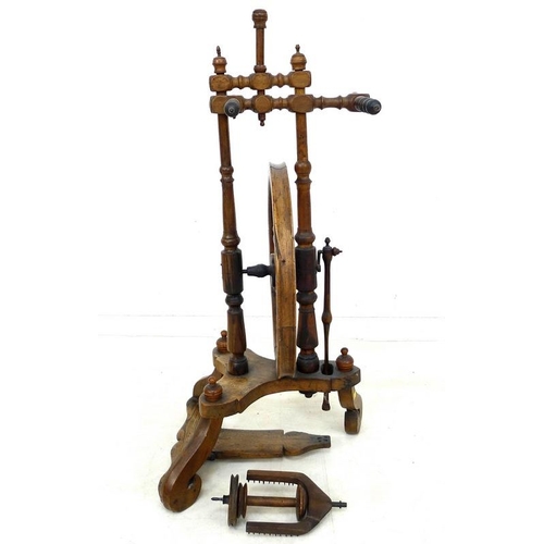 858 - A Victorian fruitwood spinning wheel, turned supports and scroll legs, 37 by 33 by 78cm high.