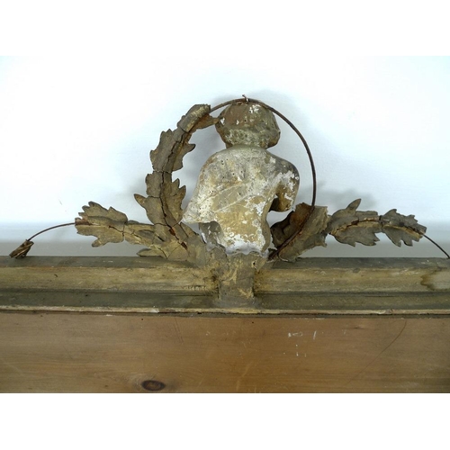 919A - A Victorian overmantel mirror, bevelled mirror glass with curved top corners, the gilt composition f... 