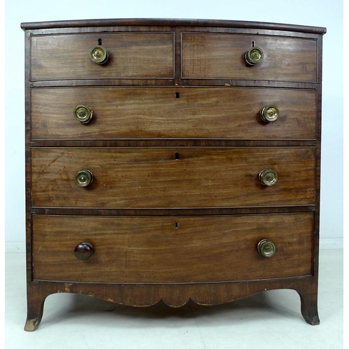 920A - A Regency mahogany bow fronted chest of two short over three long graduating drawers, with cock bead... 