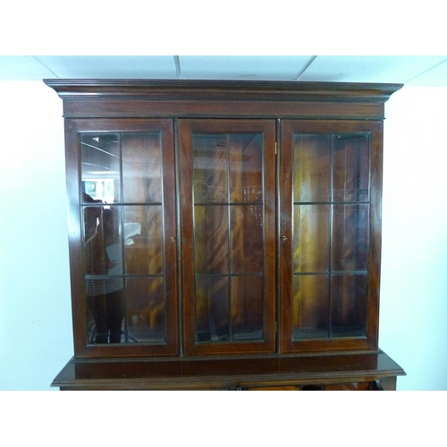 925 - A Georgian style mahogany and inlaid secretaire bookcase, third quarter 20th century, the upper sect... 