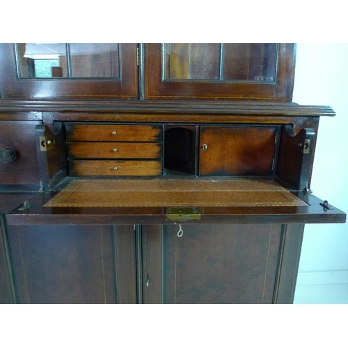 925 - A Georgian style mahogany and inlaid secretaire bookcase, third quarter 20th century, the upper sect... 