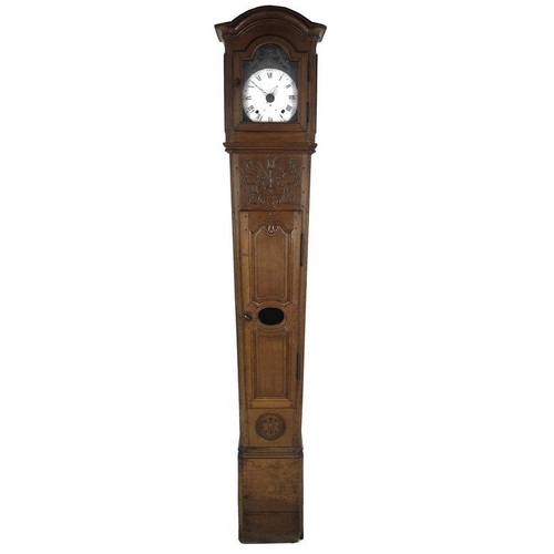 928 - A French 19th century oak tall long case clock, of tapering form with squared hood, the case carved ... 