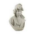 A carved stone resin bust of a young man, European School, 20th century, in an open shirt and tassel... 