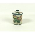 A Wemyss strawberry pattern jam pot and cover, circa 1900, the body painted with ripening strawberri... 