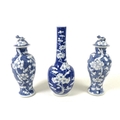 A group of three Qing Dynasty Chinese vases, comprising a late 19th century mallet vase, decorated i... 