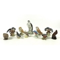 A group of Beswick figurines, modelled as birds comprising a Beneagles osprey flask, a smaller Benea... 
