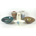 A collection of studio pottery including a Falconware fan form vase with applied blue budgie, 17.5 b... 