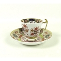 An assortment of late 18th / early 19th century tea cups to include a Spode Imari colour cup and sau... 