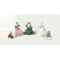 A Royal Doulton figural group, modelled as 'St George', HN2051, 20cm together with four Royal Doulto... 