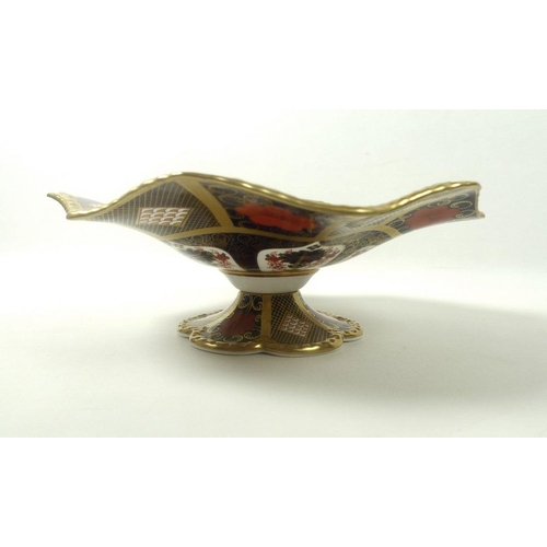 501 - A Royal Crown Derby Imari pedestal bowl in pattern number 1128, with lobed base to a flared and flut... 