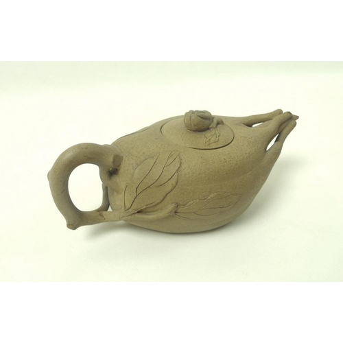 515 - A Chinese Yixing stoneware teapot and cover, late Qing / Republic period, formed as a mandrake root,... 