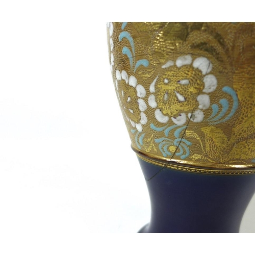 520 - A Doulton Lambeth baluster vase with flared rim, early 20th century, decorated in treacle glaze over... 