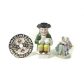 A group of porcelain comprising a 19th century Toby jug, possibly Sampson with gold anchor mark, car... 