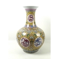 A large Chinese porcelain vase, late 20th century, the body transfer printed with circular reserves ... 
