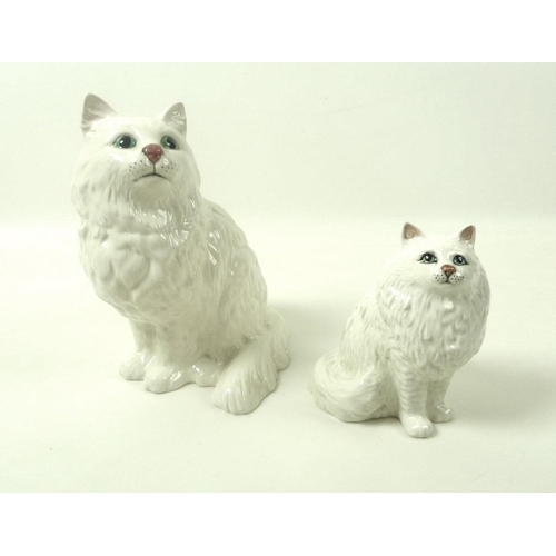 536 - A Chinese glazed Dog of Fo, a Lladro polar bear, two Beswick cats impressed marks 1867 and 1880, a B... 