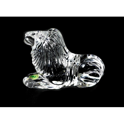 538 - A Waterford glass lion ornament, 17 by 12cm, boxed, plus a clear glass Krosno decanter with stopper,... 