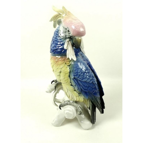 547 - A pair of Dresden porcelain figurines, modelled as green woodpeckers, printed factory marks, togethe... 