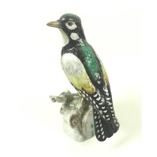 547 - A pair of Dresden porcelain figurines, modelled as green woodpeckers, printed factory marks, togethe... 