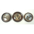 A group of three Staffordshire pot lids in oak frames, comprising 'The Best Card', 10cm, 'War' (J Au... 