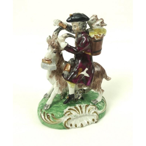 553 - A pair of Staffordshire pottery figures, circa 1830, modelled as 'The Welch Tailor & Wife Riding Goa... 