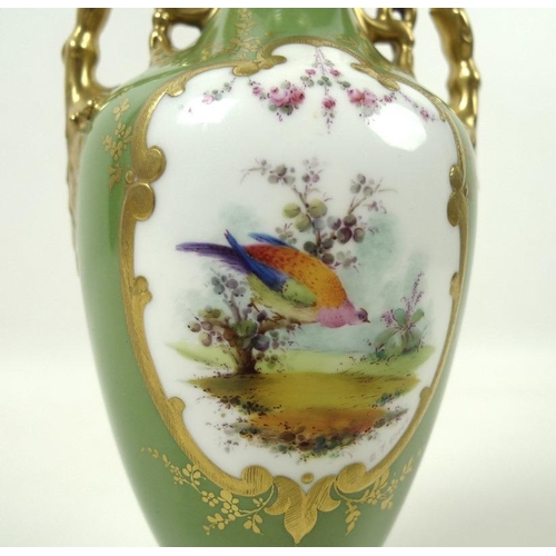 559 - A late Victorian Royal Crown Derby porcelain twin handled vase with flared rim and circular pedestal... 