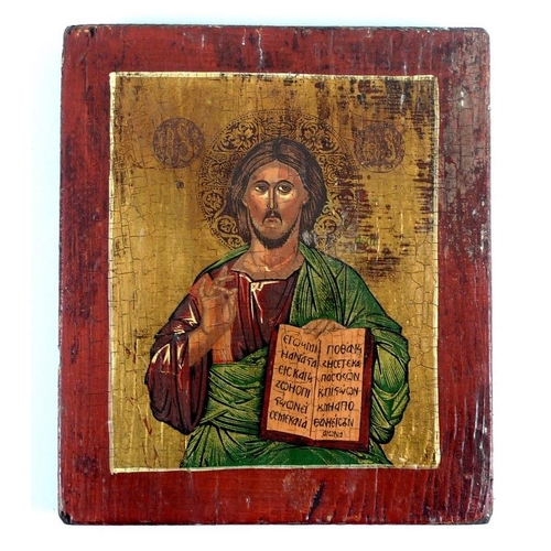 561 - A Greek Orthodox icon, late 19th or early 20th century, depicting Jesus holding a book, green title ... 