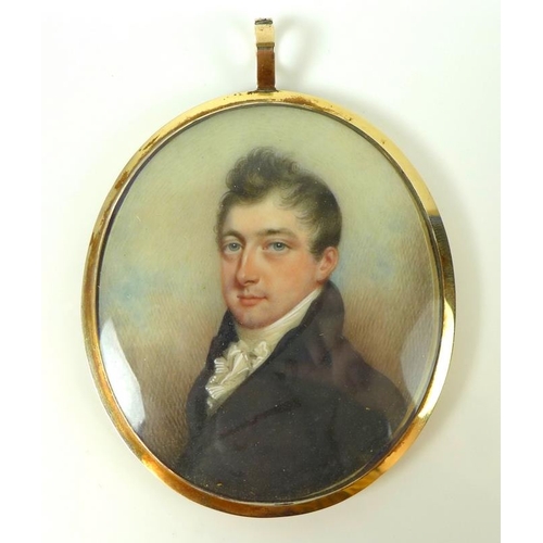 791 - A Georgian portrait miniature of a young gentleman, painted on ivory, gilt metal frame, the back of ... 