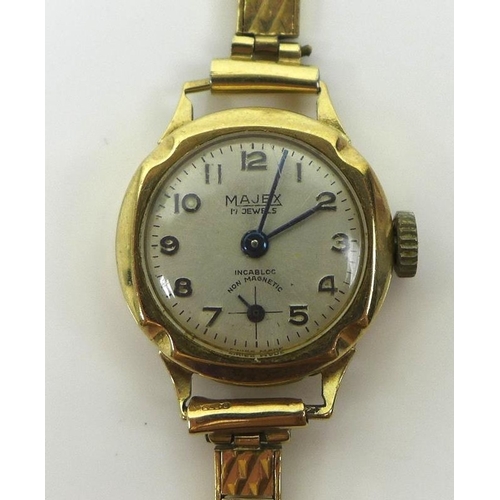 792 - A 9ct gold cased Majex, Incabloc, lady's wristwatch, circular silvered dial with subsidiary seconds ... 