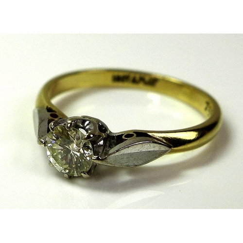 794 - An 18ct gold and platinum diamond solitaire ring, approx 0.3ct, with platinum leaf shoulders, size N... 