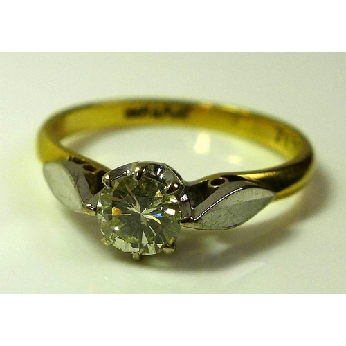 794 - An 18ct gold and platinum diamond solitaire ring, approx 0.3ct, with platinum leaf shoulders, size N... 