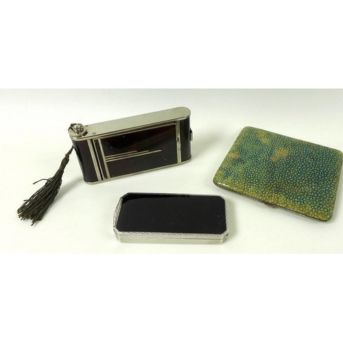 810 - An Art Deco silver and black enamel combination compact, lipstick and powder, with engine turned dec... 