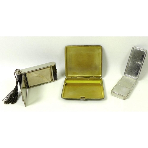 810 - An Art Deco silver and black enamel combination compact, lipstick and powder, with engine turned dec... 