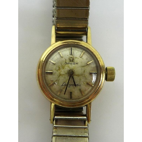 816 - An Omega 9ct gold cased Ladymatic wristwatch, circular dial with gold batons and black hands, cal 66... 