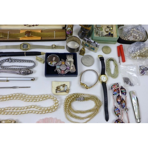 817 - A collection of costume jewellery, including silver, paste, lighters, a silver butter knife with sil... 