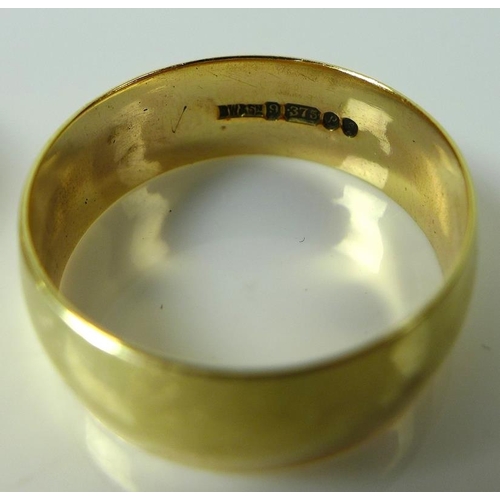 824 - Two 9ct gold wedding bands, one with bevelled edge, each with full hallmarks to the inside, sizes L ... 