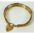 A 9ct gold four bar gate link charm bracelet with heart shaped padlock clasp, 12.8g.