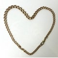 A 9ct rose gold curb link Albert chain, each link individually marked 9ct and .375, 32g.